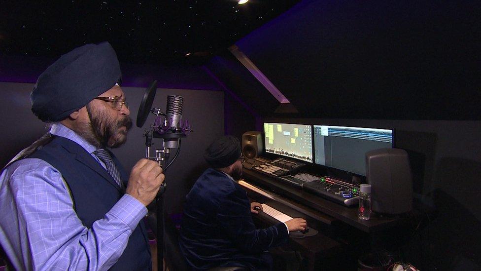 Jasbir Wouhra singing in his studio at his home in Birmingham