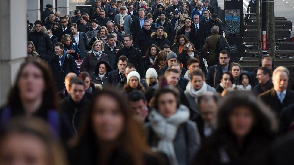 People walking to work along London Bridge