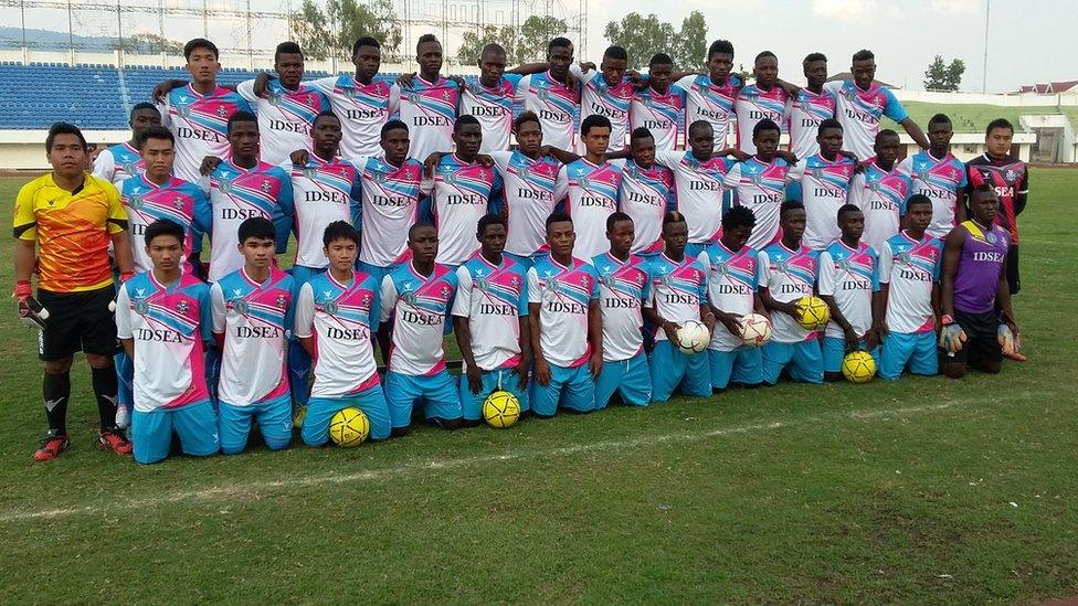 A Champasak team photo of with 30+ Africans and just 5-6 Laotians)