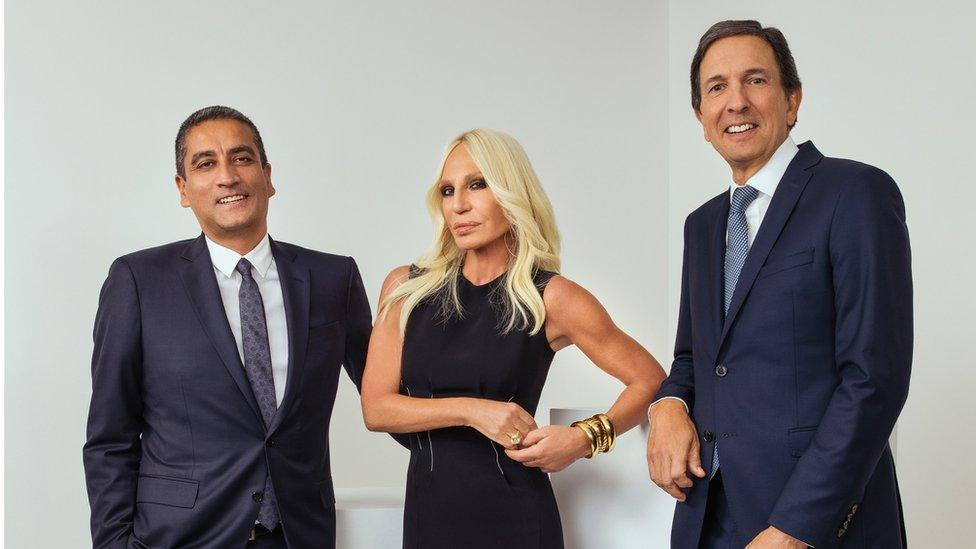 Donatella Versace with Versace chief Jonathan Akeroyd (left) and Michael Kors chief executive John Idol