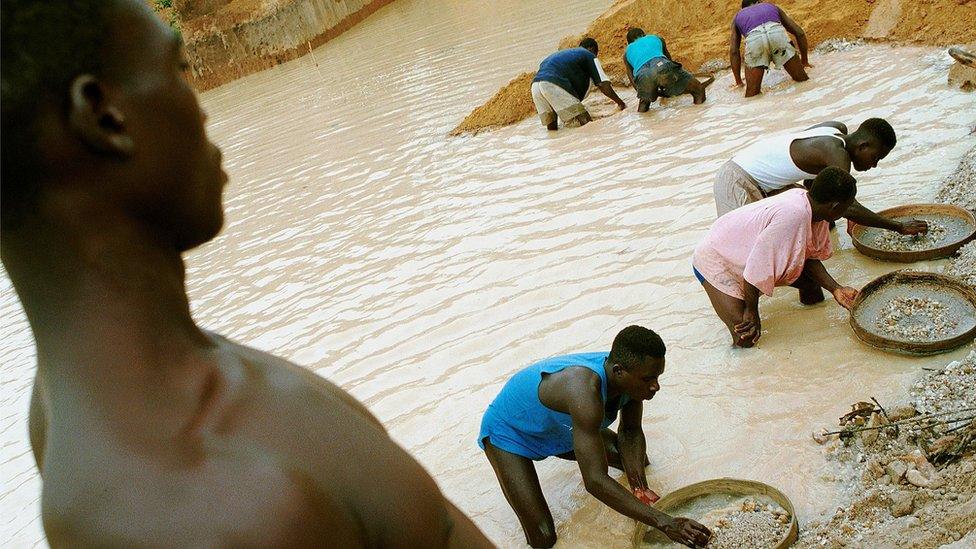 Men panning for diamonds