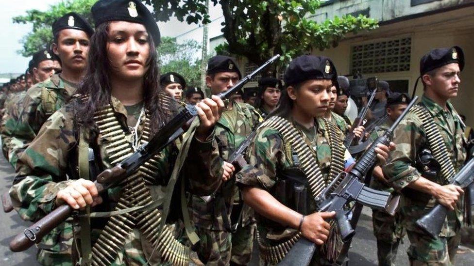 Farc guerrillas march in a military parade on 7 February 2001 in San Vicente del Caguan.