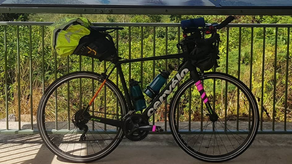 Charlie's stolen bike against a fence