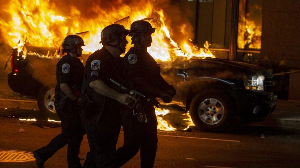 Police work to keep demonstrators back during a protest near Lafayette Square Park in Washington, DC