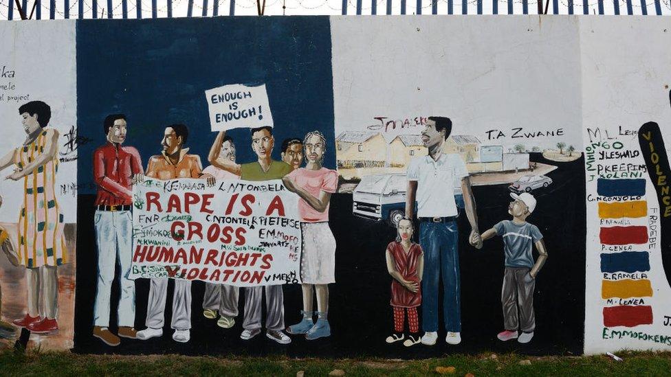 Mural painting and graffitis against the domestic violence ant rape in Soweto