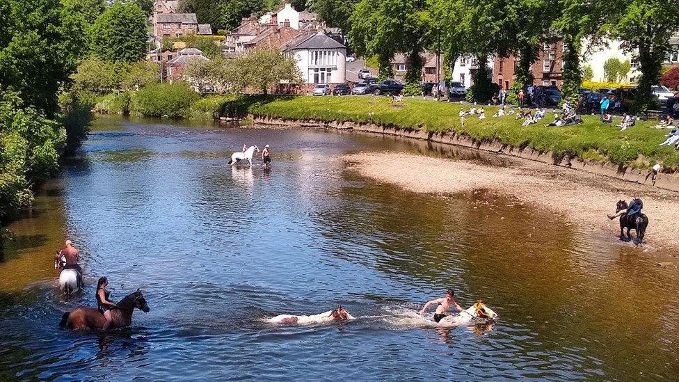 People and horses in Appleby