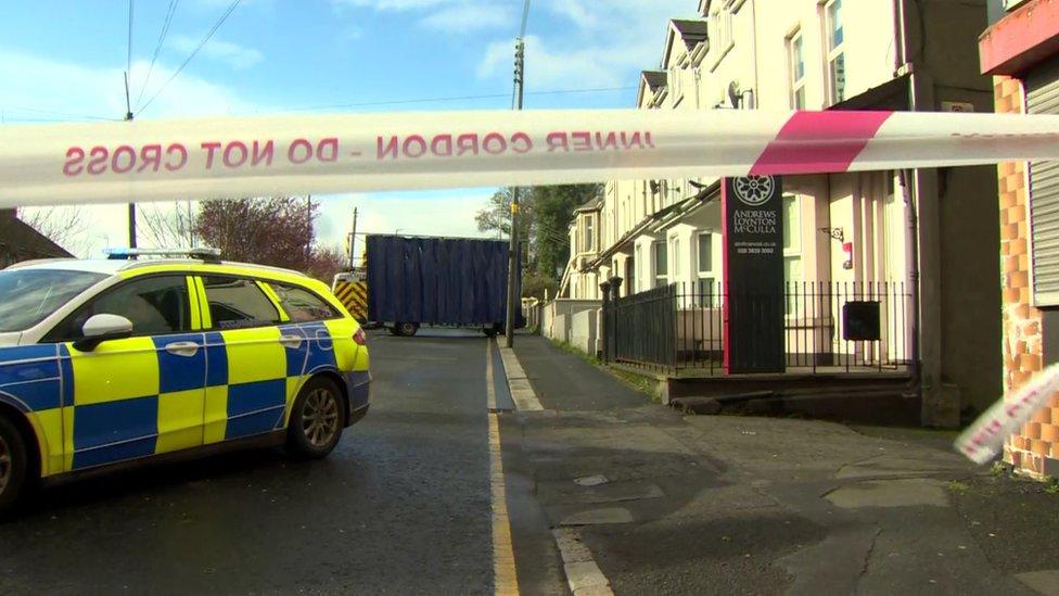 Police cordon on street at the scene of the fire