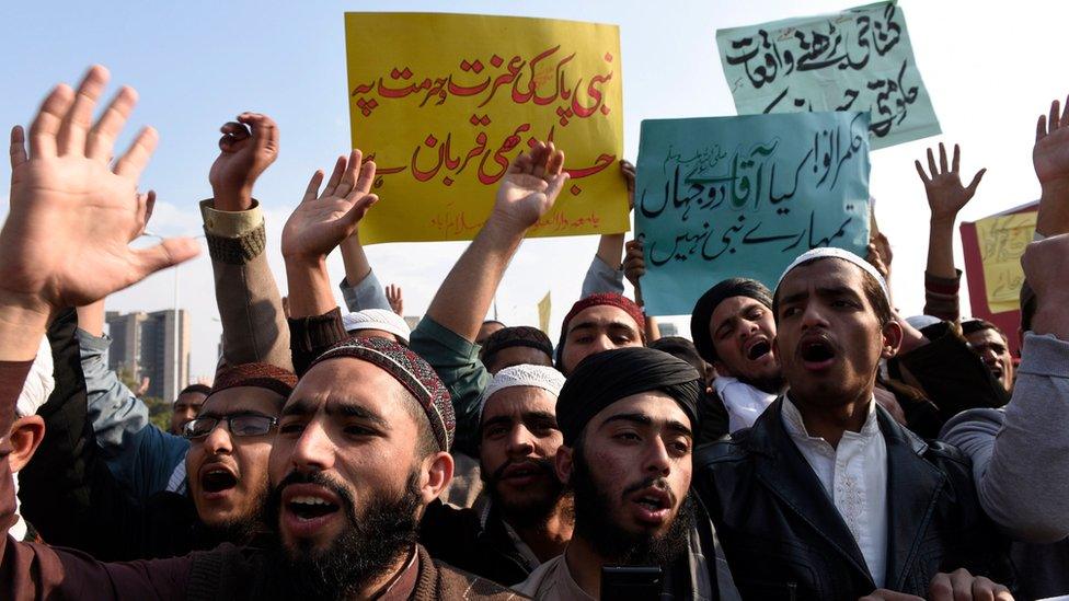 Students of Islamic seminaries hold placards reading in Urdu "Relevant authorities must take action against the blasphemous contents" as they shout slogans during a protest urging the authorities to block social media sites that are spreading blasphemous contents, in Islamabad, Pakistan, 08 March 2017