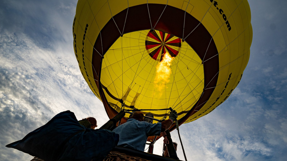 A fire burning inside a hot air balloom