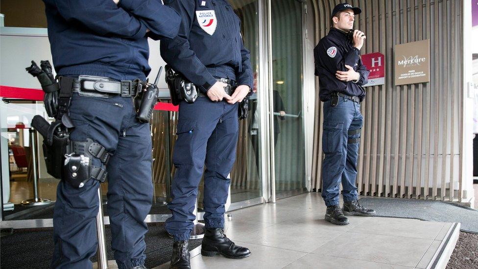 French officer of the Police aux Frontieres (PAF - Borders Police) stands guard at the entrance of the Mercure Hotel next to Charles de Gaulle airport where relatives of the passengers are welcomed near Paris, France, 19 May 2016.