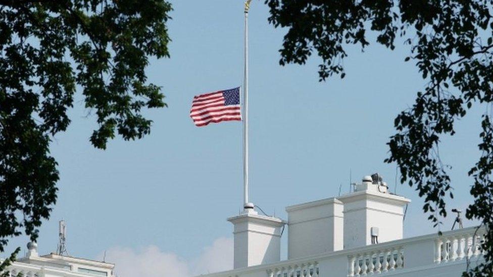 White house flag shown at half-staff on Monday afternoon