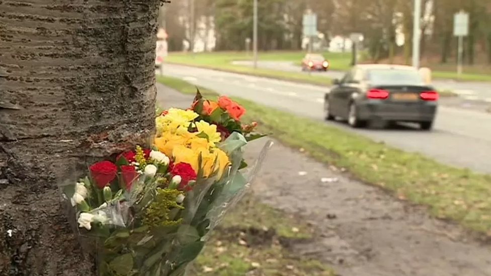 Flowers have been left at the scene