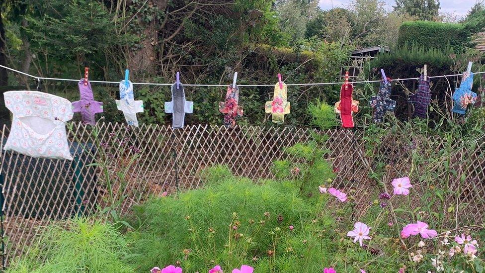 sanitary pads on a washing line