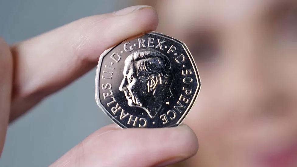 A 50p coin with an image of King Charles