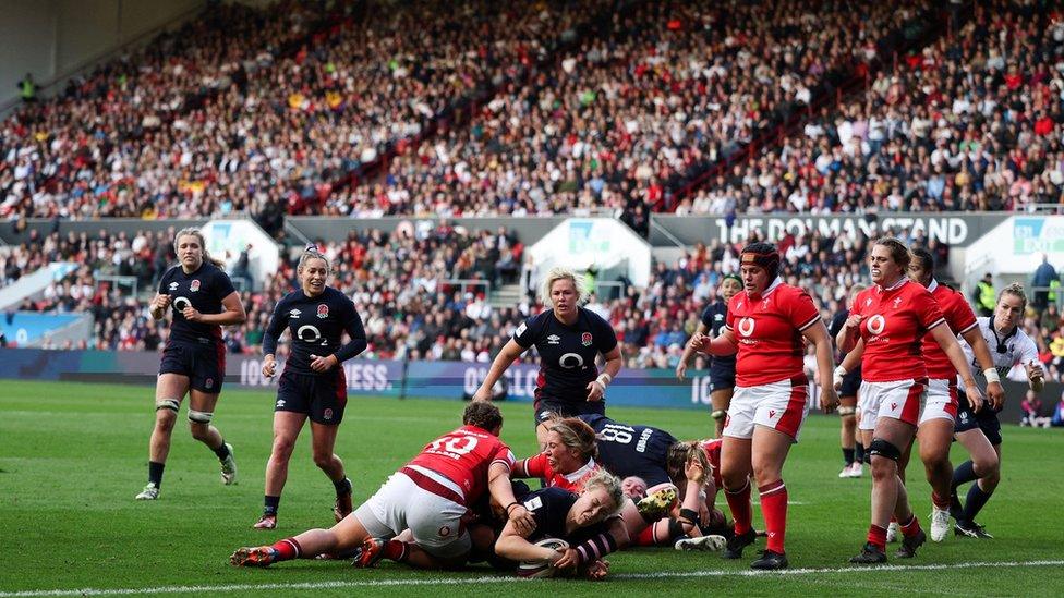 England women score a try against Wales with packed stands at Ashton Gate in the background