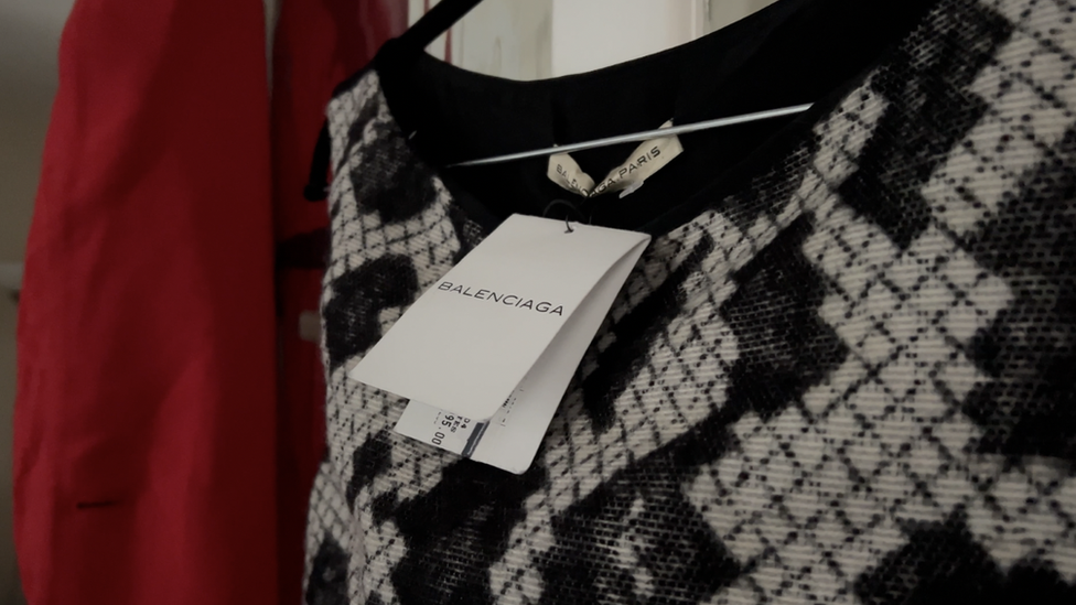 A dress with a label attached