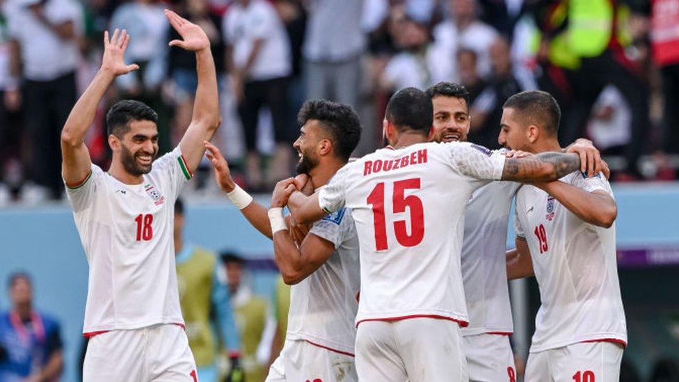 Iran celebrate their goal