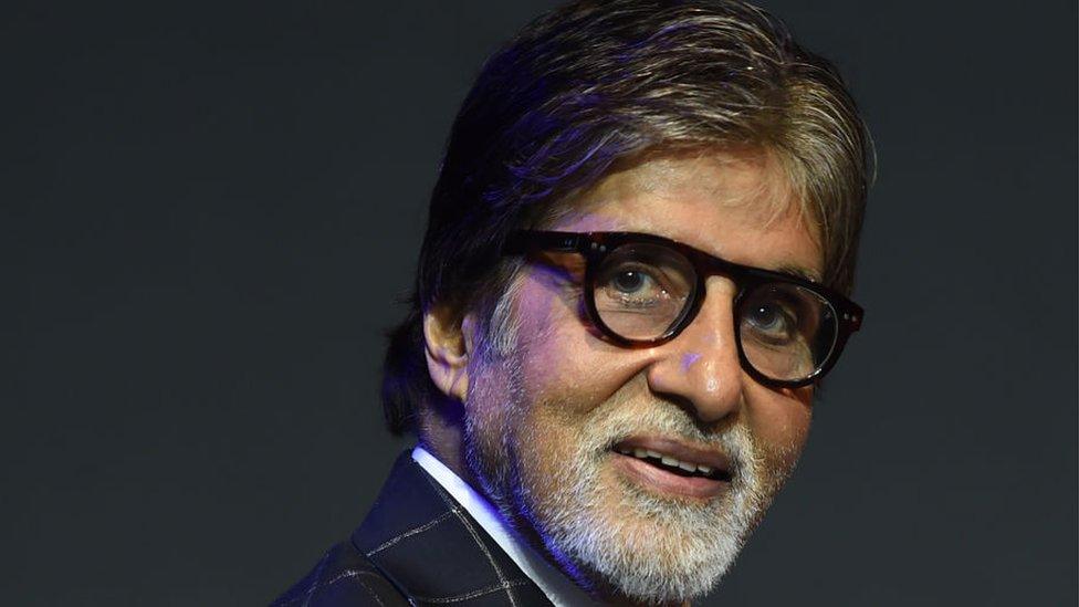 Bollywood actor Amitabh Bachchan looks on during a commercial event in Mumbai on May 17, 2018.