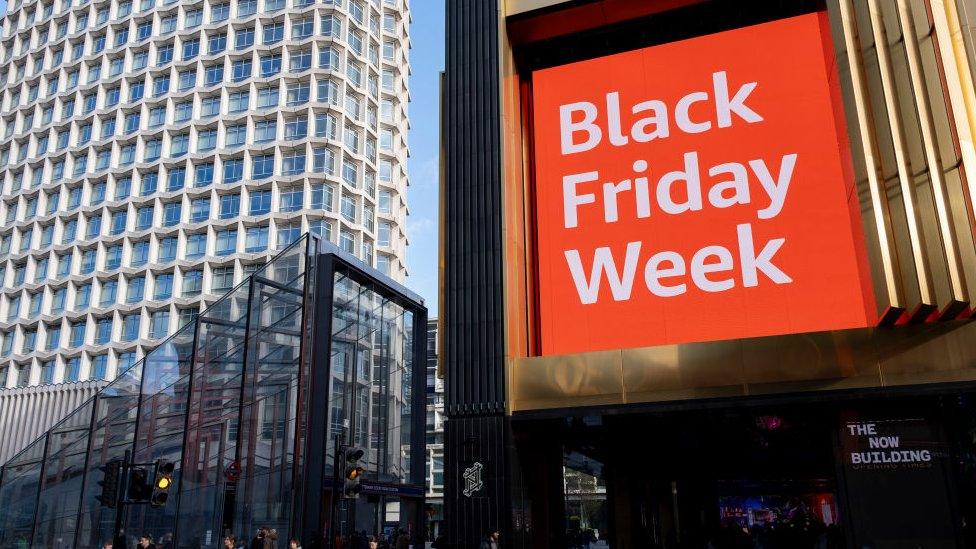 a large sign in london reads black friday week