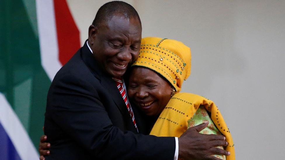 Nkosazana Dlamini Zuma is congratulated by South Africa"s President Cyril Ramaphosa after being sworn in as South Africa"s Minister of Cooperative Governance and Traditional Affairs in Pretoria, South Africa, May 30, 2019