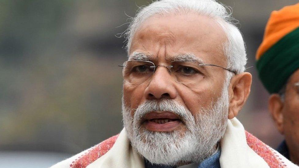 In this file photo taken on January 31, 2019 Indian Prime Minister Narendra Modi addresses the media after his arrival at parliament for a budget session in New Delhi