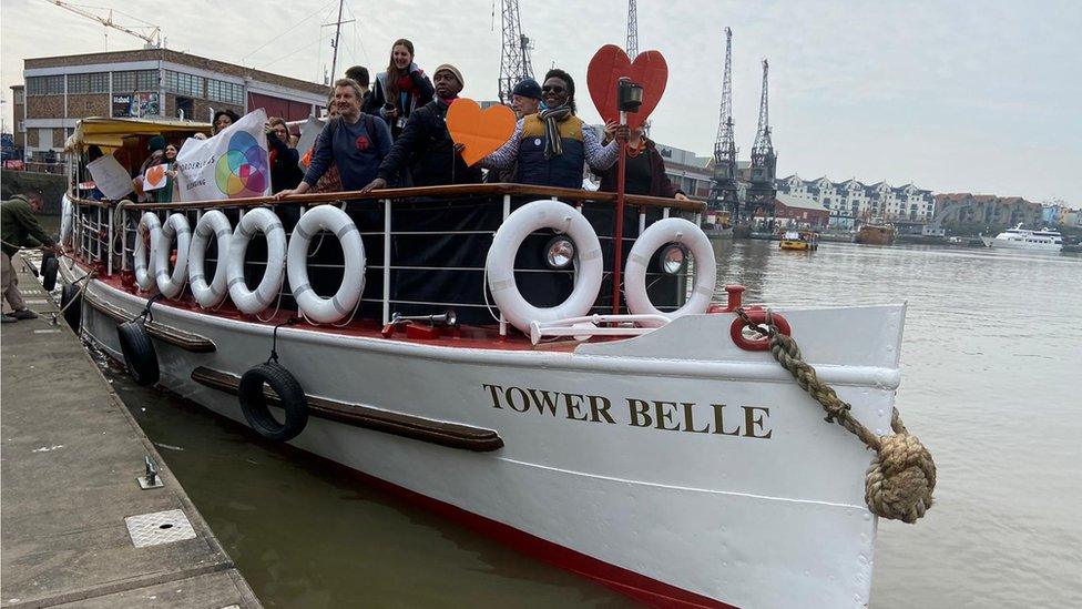 A ferry boat setting off for the procession