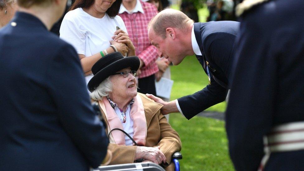 The Duke of Cambridge speaks with 100-year-old Diana Mayes, who was widowed in 1943