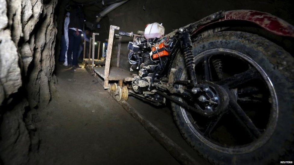 A 15 July 2015 photo shows a motorcycle modified to run on rails is seen inside a tunnel connected to the Altiplano Federal Penitentiary.