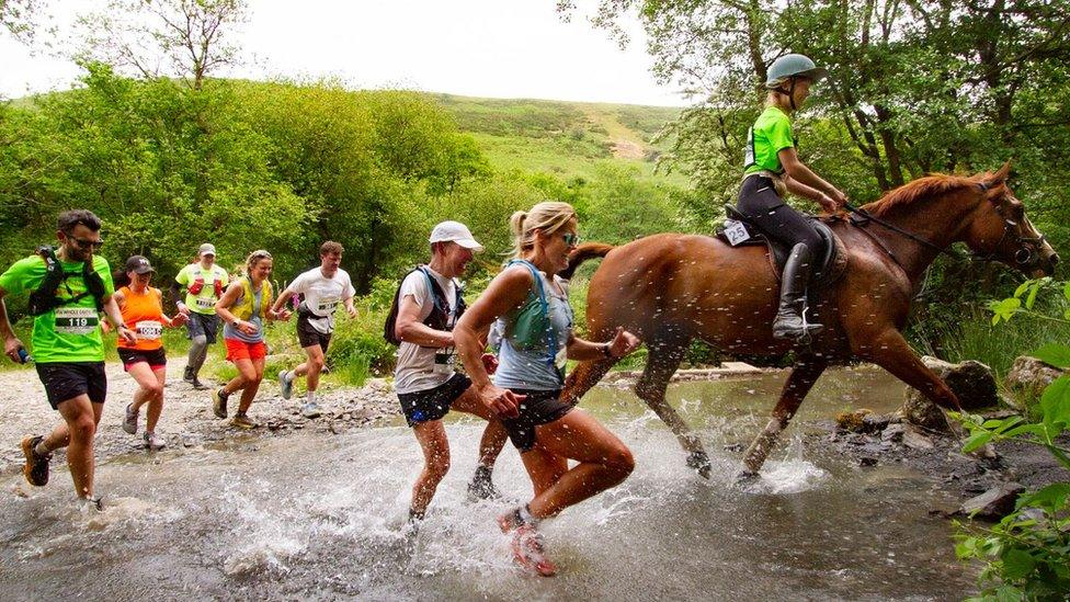 The race pits man against horse over a 22.5-mile course in Llanwrtyd Wells, Powys