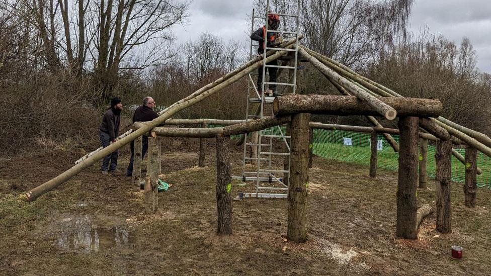 Iron Age round house replica being built