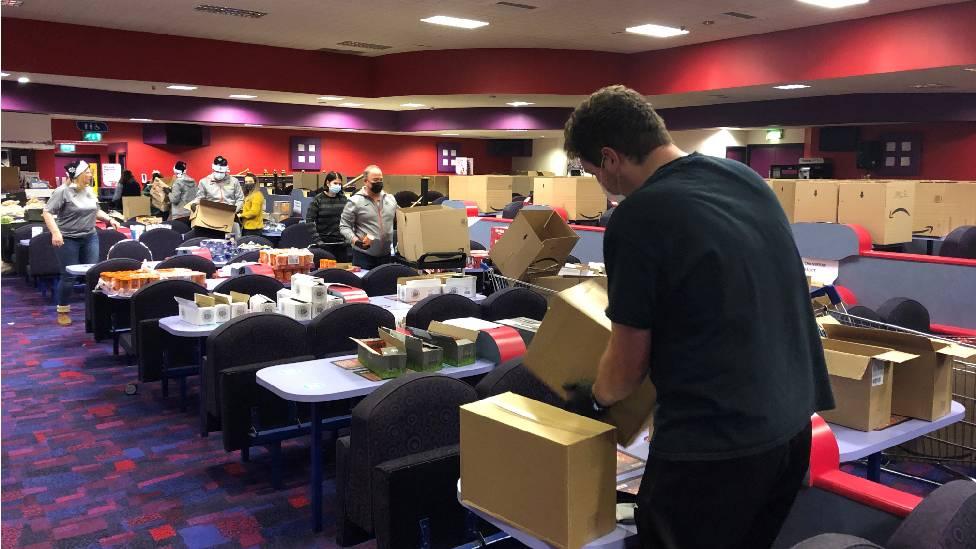 Volunteers packing hampers