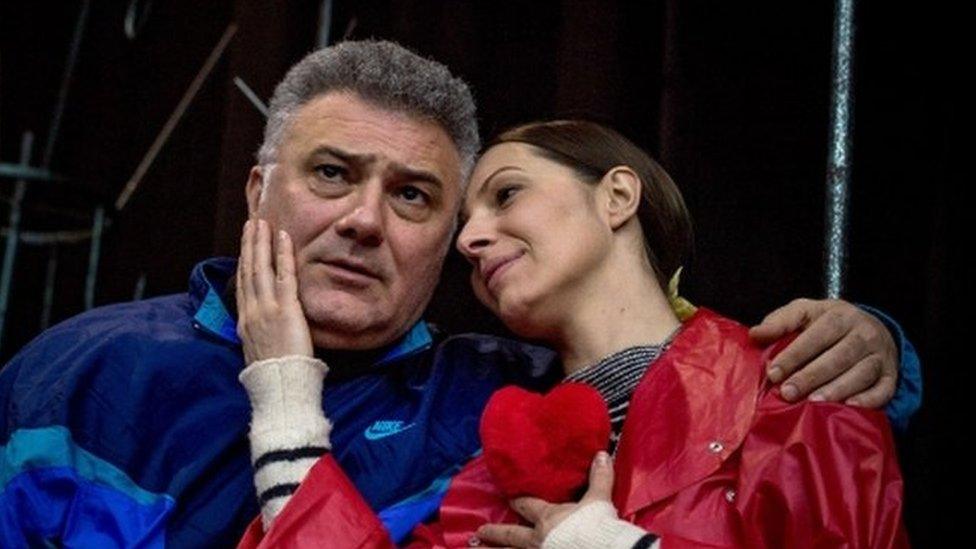 Actress Ivana Kovacevic (R) as Mira Markovic, wife of former Serbian strongman Slobodan Milosevic, and actor Dejan Cicmilovic, as Milosevic perform on stage during a rehearsal of the play "Slobodan Show" in a theatre in Belgrade on 27 February 2018