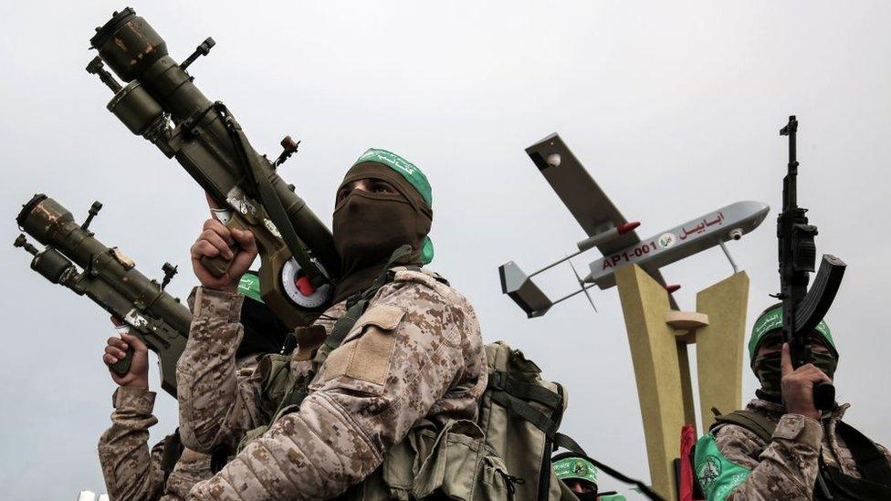 Members of Hamas's military wing, the Izzedine al-Qassam Brigades, attend a memorial in the southern Gaza Strip town of Rafah (31 January 2017)