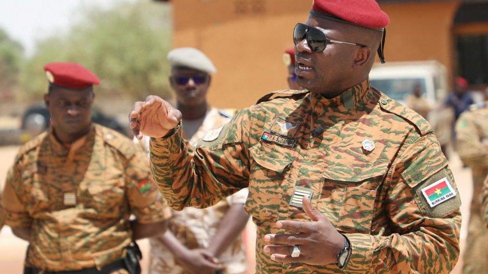 Burkina Faso President Lieutenant Colonel Paul-Henri Damiba addresses his soldiers to motivate them, after armed men killed civilians and militaries over the weekend in Seytenga, at airport in Dori, Burkina Faso June 15, 2022