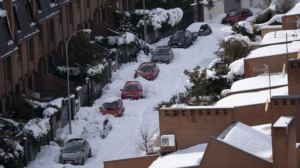 Cars covered by snow after the Storm Filomena in Madrid, Spain