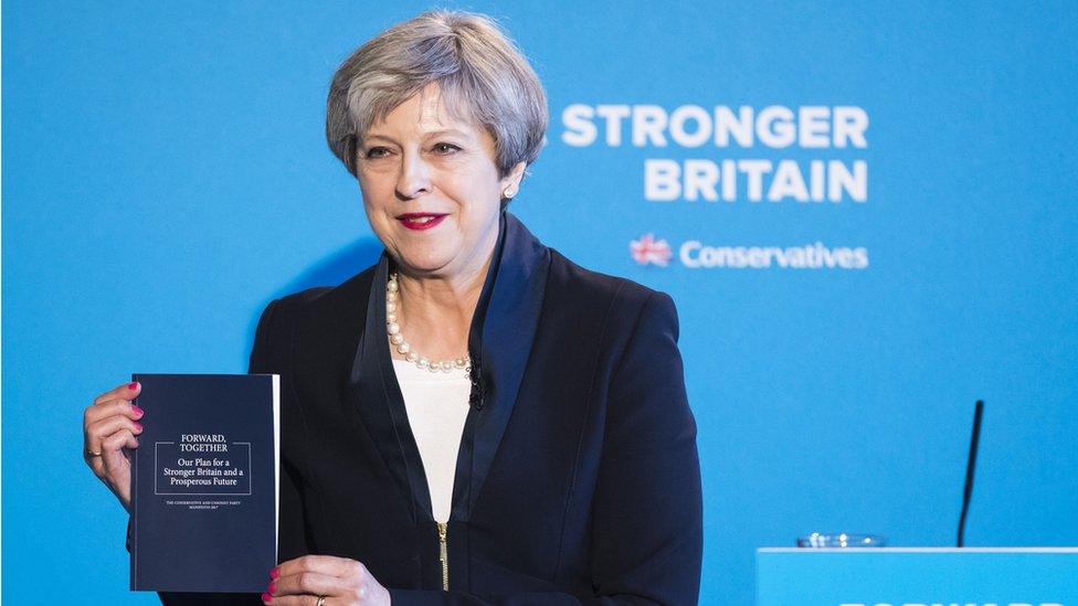 Theresa May holds the Conservative party's election manifesto