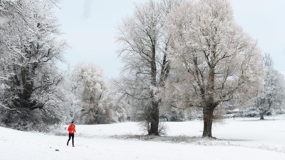 A man jogging through a park in High Wycombe