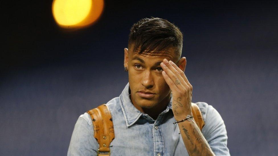 Barcelona's Neymar leaves after a Spanish La Lira soccer match between Atletico Madrid and Barcelona at the Vicente Calderon stadium in Madrid, Saturday, Sept. 12, 2015.