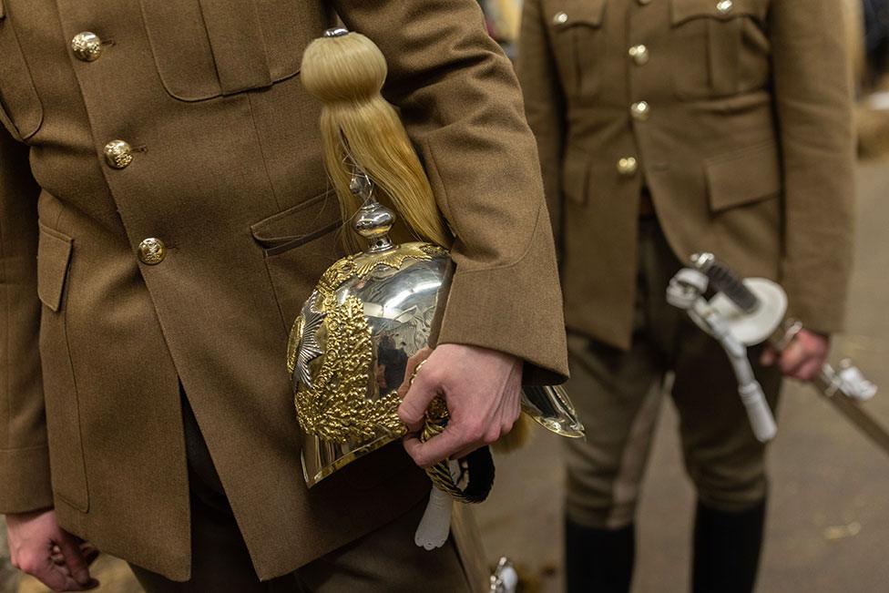 Members of the Household Cavalry Mounted Regiment prepare for a night time rehearsal for the coronation of King Charles III at Hyde Park Barracks on 17 April 2023 in London, England