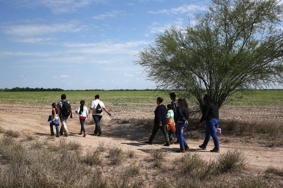 Families crossing from Mexico to US