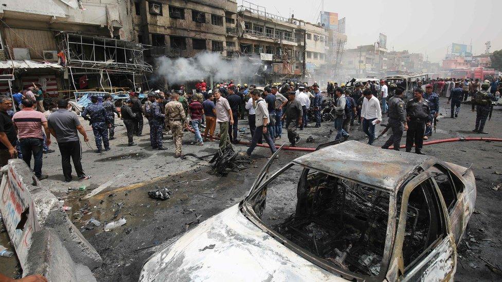 Aftermath of car bomb attack in Baghdad's Jadida district on 9 June 2016