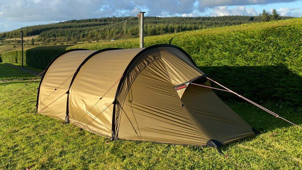 Charles Attonaty's beige-coloured tent pitched in Ciaran McNichol's garden