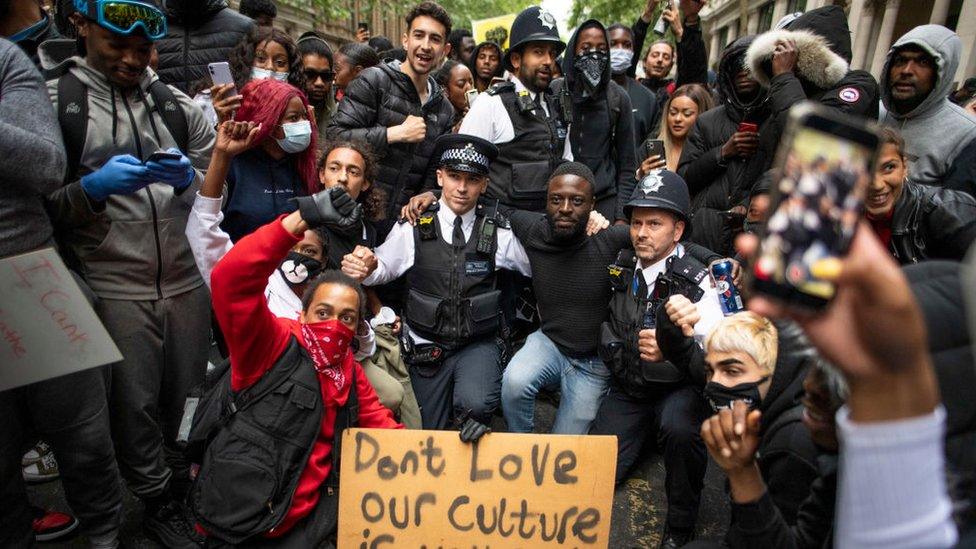 protestors-with-police.