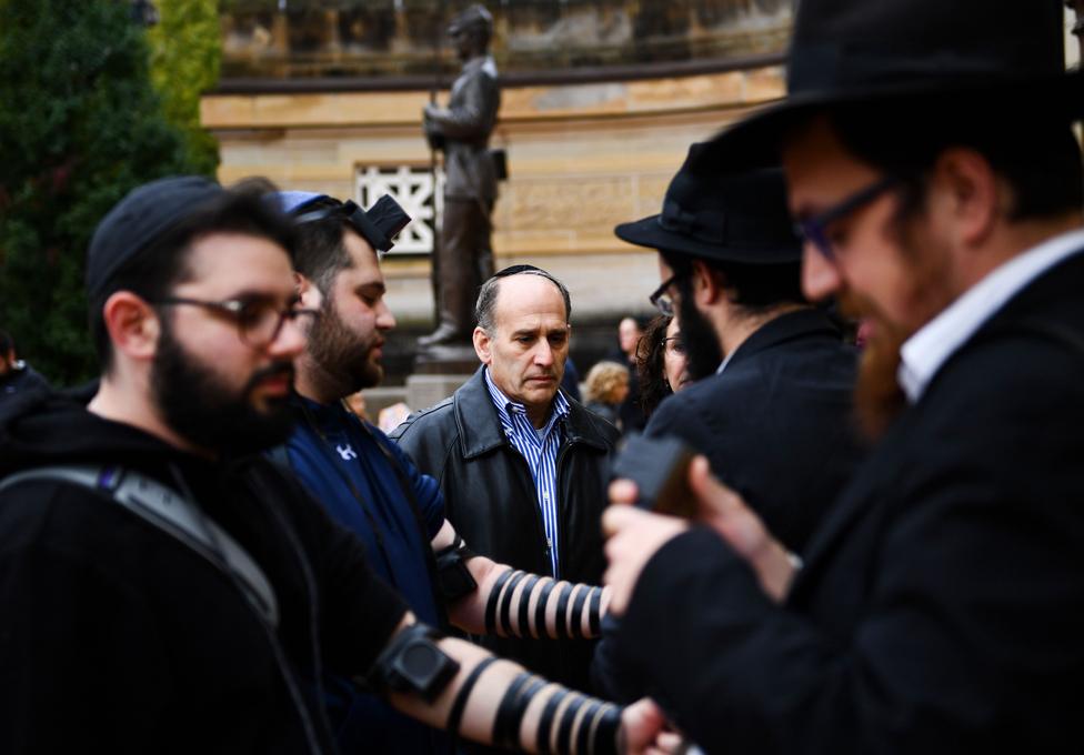 A vigil is held at the Tree of Life synagogue in Pittsburgh, in memory of the 11 people who died