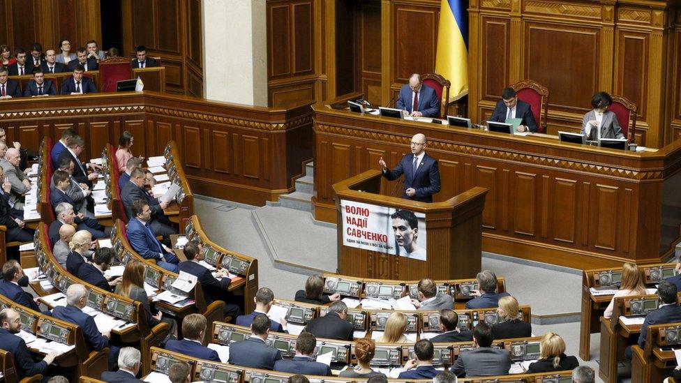 Former Ukrainian Prime Minister Arseniy Yatsenyuk addresses parliament