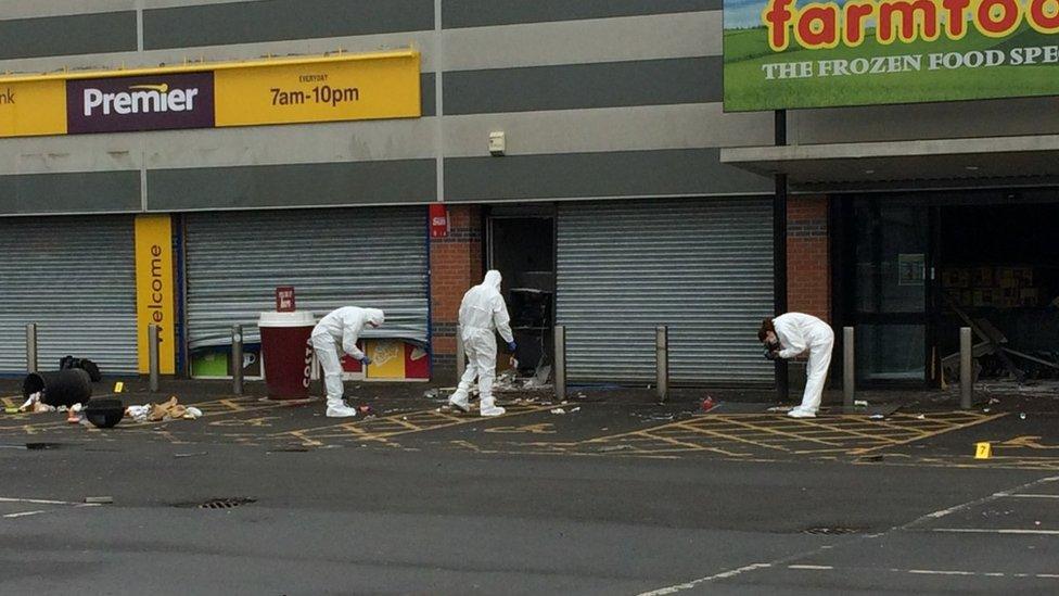 forensic officers at the scene