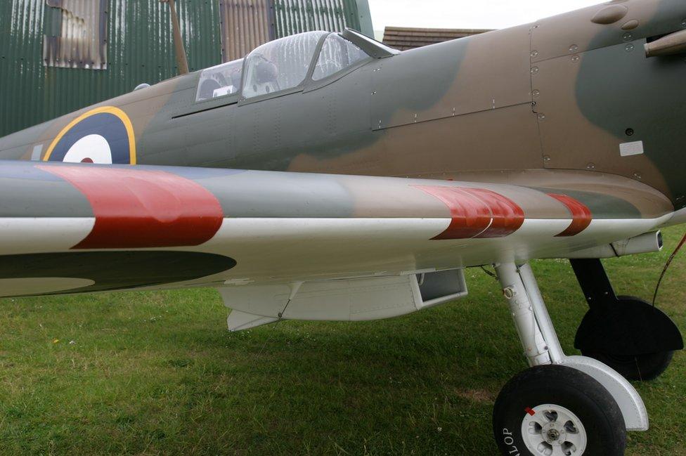 Spitfire wing and gun ports