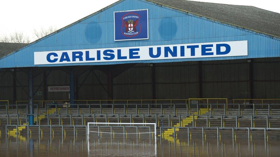 Flood water covers the pitch at Carlisle United