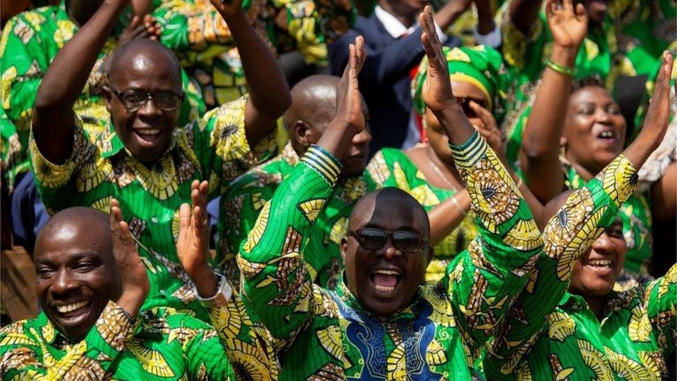 Supporters of Burundi"s President elect Evariste Ndayishimiye cheer as they attend his inauguration ceremony following the sudden death of his predecessor Pierre Nkurunziza, amid the growing threat of the coronavirus disease (COVID-19), at the Ingoma stadium in Gitega, Burundi June 18, 2020.