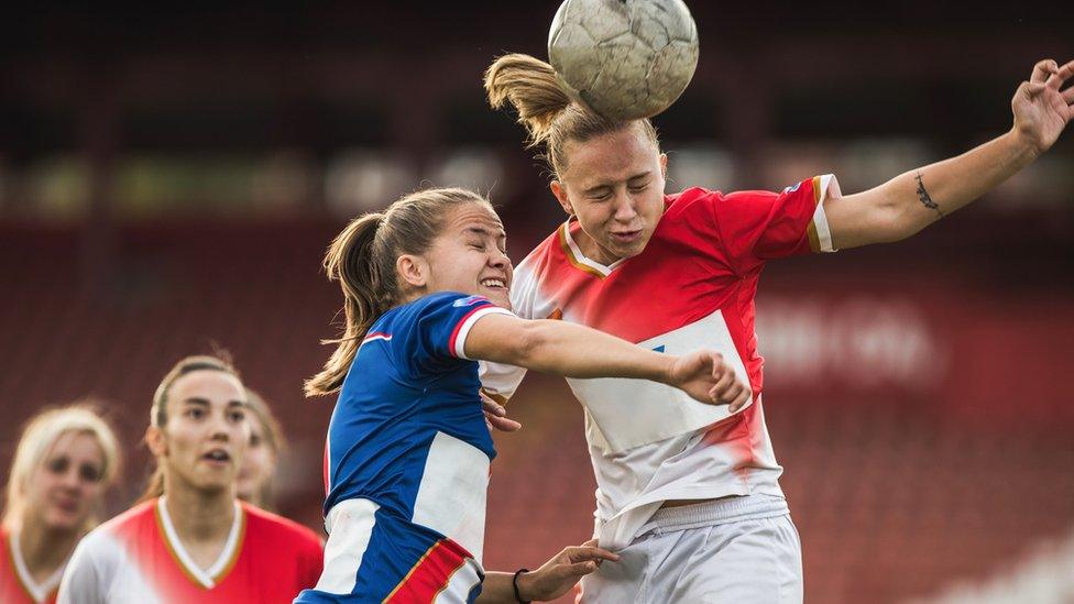 Women playing football